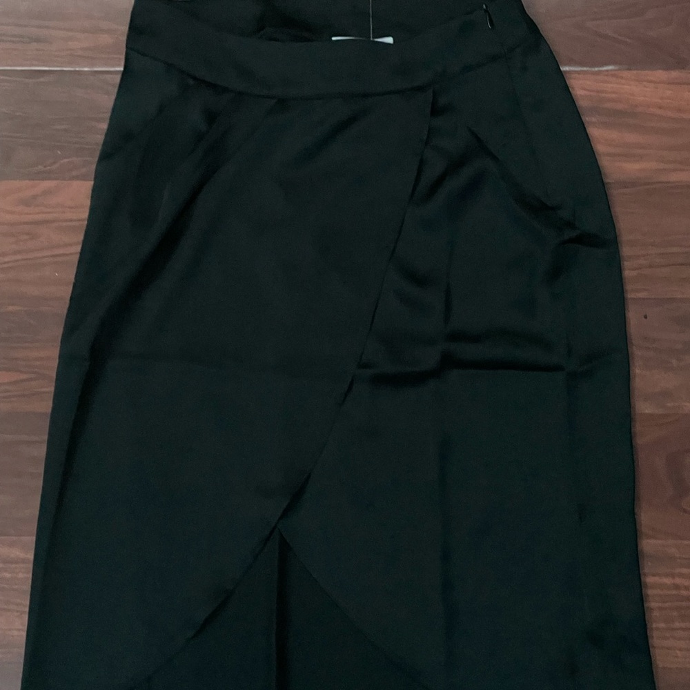 Black silk skirt. New with tags. Size medium